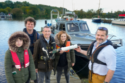 Picture of the DAERA Minister, Andrew Muir at Ballyronan Marina with some of the AFBI Freshwater ResearchTeam