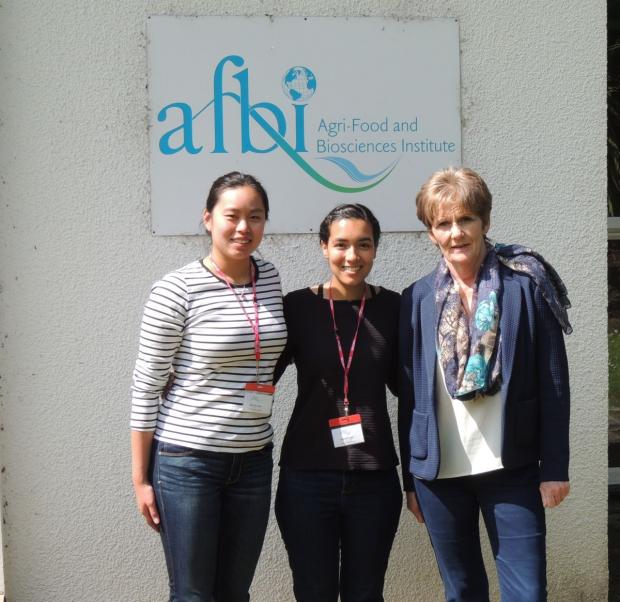 North Carolina State University students Sarah Tong and Selena McKoy with Mairéad Kilpatrick on a visit to AFBI Loughgall