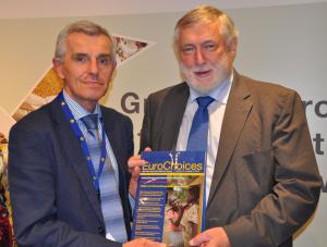 Professor John Davis (pictured left) presents Dr Fischler with a copy of EuroChoices.